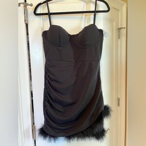Black, feather hem mini dress.
